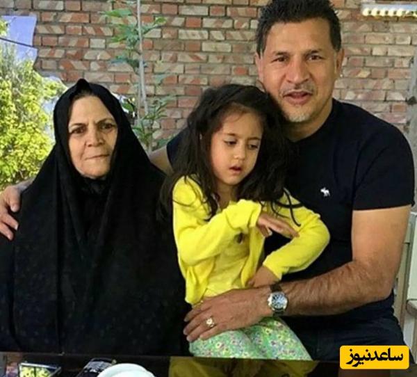 نگاهی به دکوراسیون شیک و بدون تجملاتمنزل خانه مادری علی دایی با رونمایی از عکس آتلیه ای شهریار ایران و دخترش نورا روی دیوار پذیرایی +عکس /شیک در عین سادگی...
