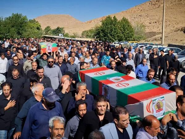 فیلم | سرزمین کنگاور ۲ شهید مدافع امنیت را در آغوش گرفت