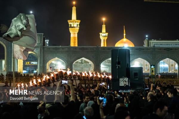 آیین مشعل گردانی شب تاسوعا در مشهد