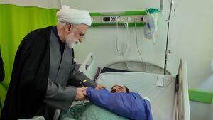 عکس/ عیادت اژهای از مجروحان حمله صهیونیستها به زندان اوین